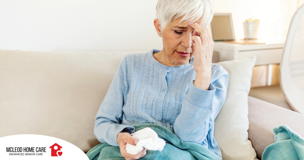 An older sick woman represents what family caregivers want to avoid, especially during flu season.