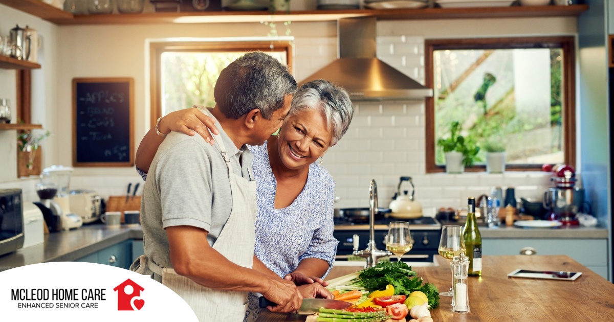 An older couple prepares healthy food together representing National Nutrition Month.