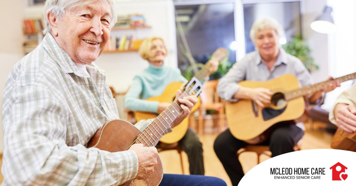 A group of seniors enjoy playing instruments together showing the impact of music for older adults.
