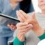 A caregiver provides in home care services to a senior with arthritis