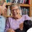 Through dementia care at home, a caregiver provides support to a senior.
