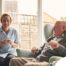 A caregiver provides Memory Care at Home to a senior