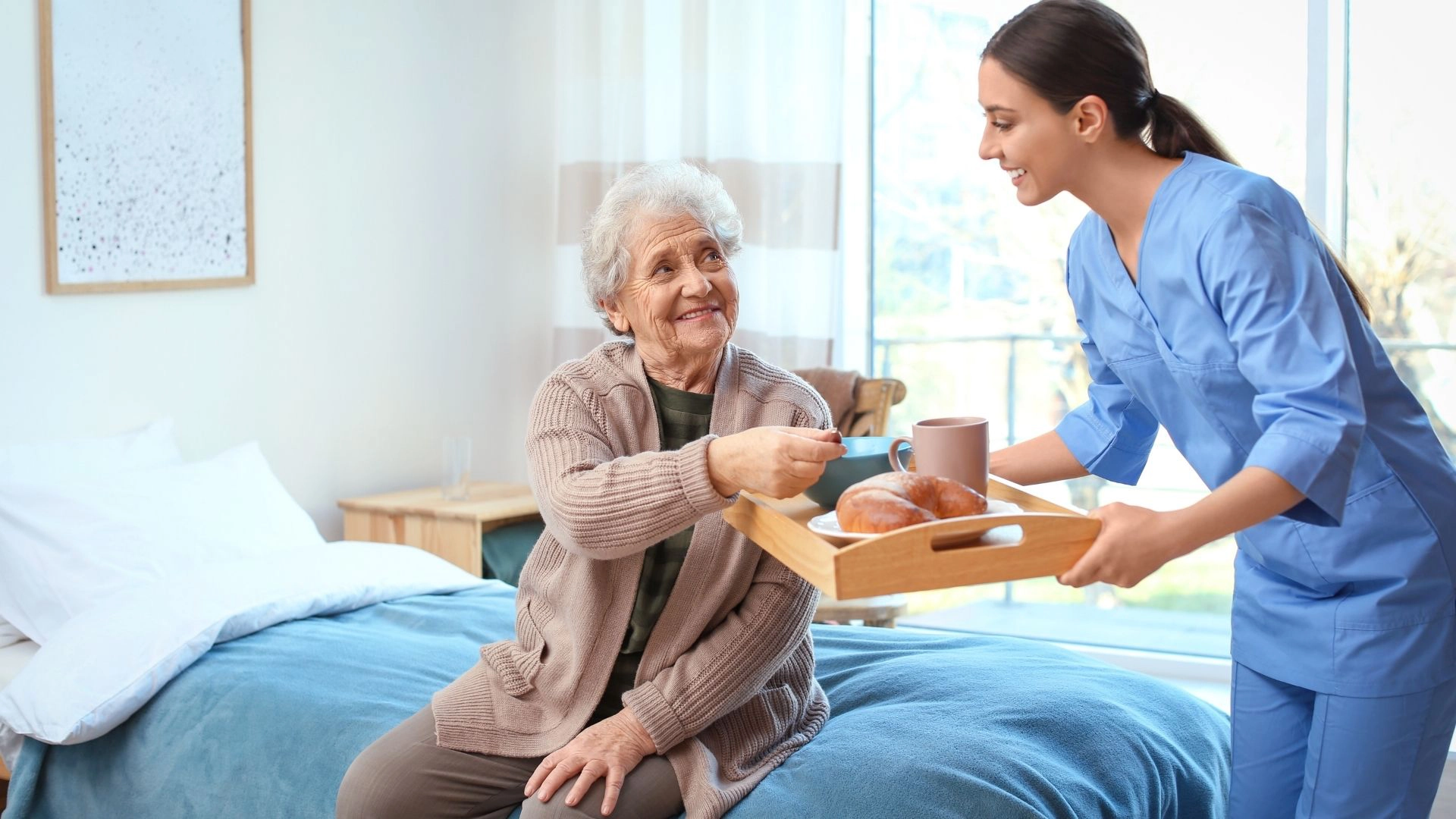 Caregiver giving meals to senior – Meal Preparation in Greenville Caregiver giving meals to senior - Meal Preparation in Greenville